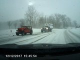 Truck Slides into Jeep During Snow Storm in a Hit and Run