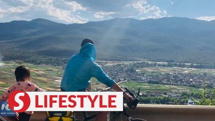 Father bikes 4,000 km to Tibet with 4-yr-old daughter