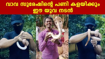 Tovino Thomas Playing With Tiny Snake