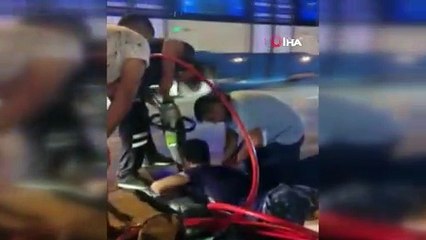 Telefonunu çıkarmak isterken mazgala kolu sıkışan genci itfaiye kurtardı