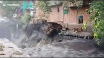 Two-story building comes crashing down after heavy rain lashes Indian capital