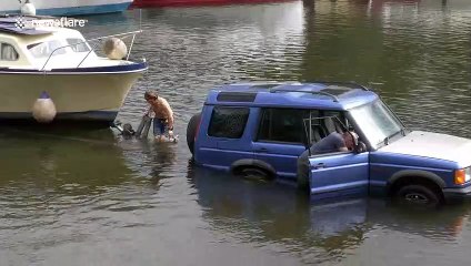 Car becomes submerged in River Thames in London