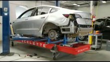 TESLA REPAIR on CELETTE FRAME MACHINE on purpose of collision repair training