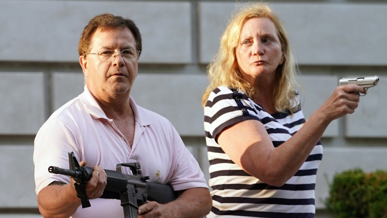 Gunslinging Couple Face Charges For Aiming At Protesters
