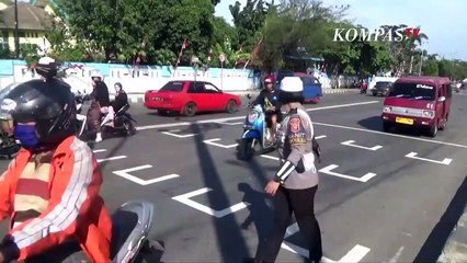 Jaga Jarak Motor di Lampu Merah Ala Sirkuit MotoGP