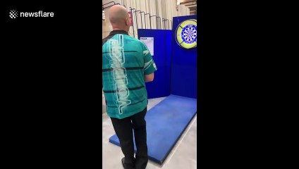 World famous darts player beaten by 8-year-old boy in Orpington, UK