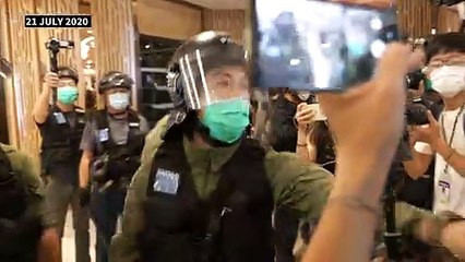Hong Kong police, demonstrators clash on anniversary of protest attack