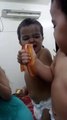Adorable baby flexes muscles with dad in front of mirror Amazona