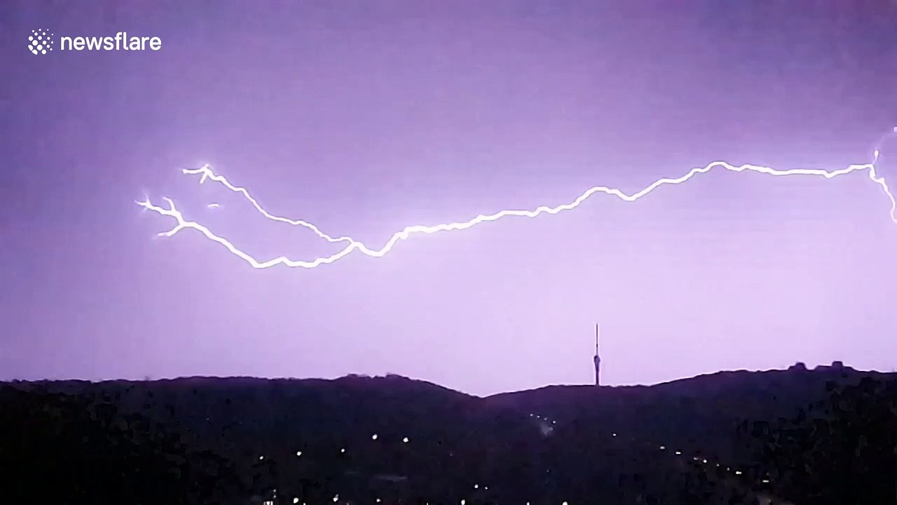 Elongated fork lightning captured above the skies of Lisbon