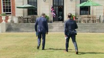 German and British Foreign officials rescue fallen flag