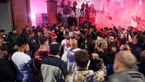 Fans celebrate outside Anfield as Liverpool lift Premier League trophy