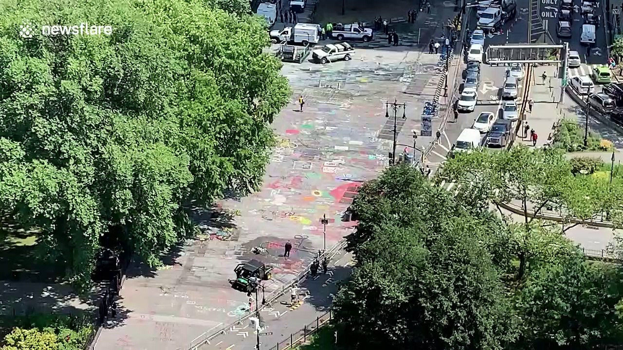Crews work to clean up City Hall Plaza after NYPD clear out 'Occupy City Hall'