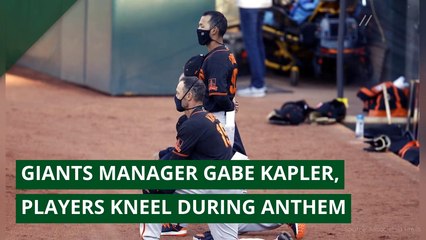 Giants manager Gabe Kapler, players kneel during anthem, and other top stories from July 23, 2020.
