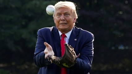 Donald Trump plays with baseball players at the White House
