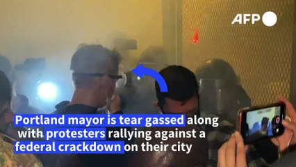 Portland Mayor amid tear gas in front line of a protest against Federal intervention