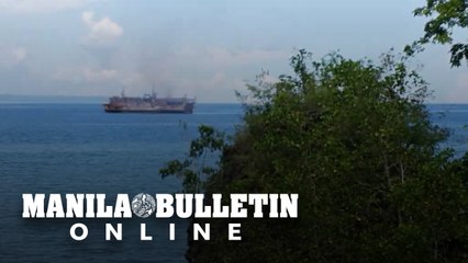 Fire razed passenger ship being pulled by a tug boat in Sogod, Cebu