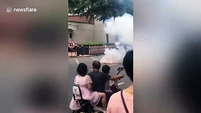 Chinese citizens set off fireworks in front of US consulate in Chengdu