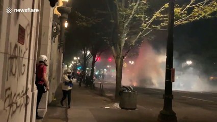 Tear gas forms 'tornado' as clashes continue in Portland