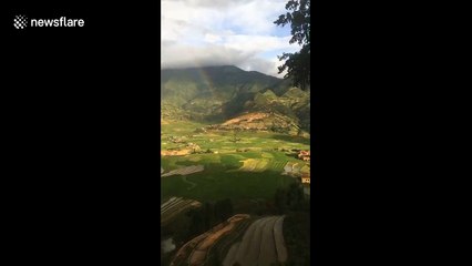 Both ends of double rainbow caught on camera from mountaintop in Vietnam