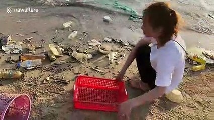 Boy drives tractor to help family collect ocean trash in Cambodia