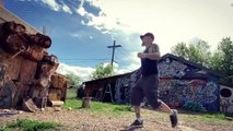 Guy Pins Beer Can to Wooden Log by Throwing Axe