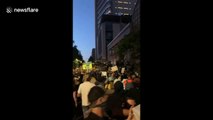 Demonstrators answer to their mayor Ted Wheeler during protest in Portland, Oregon