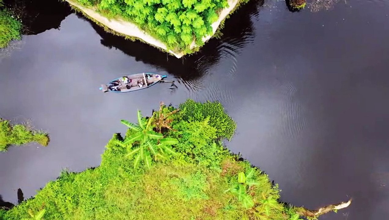 Drone view of Boat Floating on Water