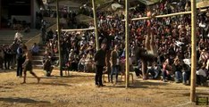 Naga boy kicks hard and falls on his head at meat-kicking competition
