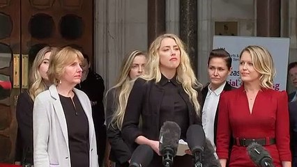 Amber Heard gives statement outside High Court