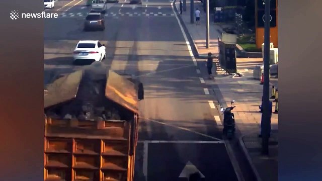 Tyres fly off moving truck and knocks down pedestrian in China