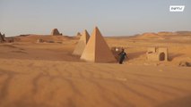 Modern tricks, ancient pitch! Sudanese freestyler shows his skills at Nubian Pyramids
