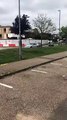 A car is pictured carrying out a three point turn on a busy one way street in Peterborough city centre