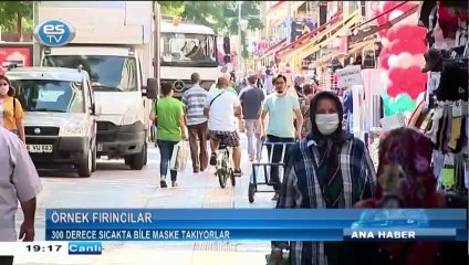 300 derece sıcakta bile maske takıyorlar