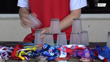 Watch this Florida sport stacking champion arrange cups in record time