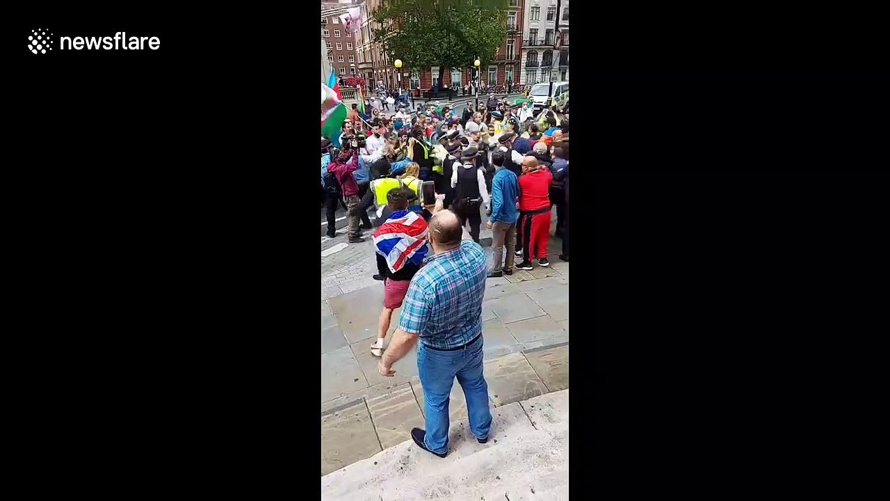 Police intervene as scuffles break out between Armenian and Azerbaijani groups in central London