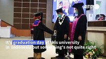 Robots stand in graduates' place in Indonesian university