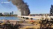 Railroad fire after train derails over Tempe Town lake bridge in Arizona