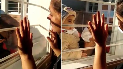 Reencuentro de una mamá y su hijo separados por el coronavirus