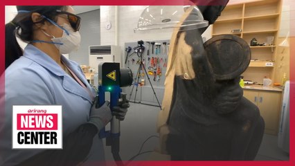 Exhibition shows painstaking process of restoring art