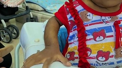 Family of baby girl with rare condition causing tummy to swell appeal for help with treatment