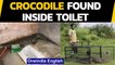 A crocodile found inside the toilet of a house, released into the river | Oneindia News
