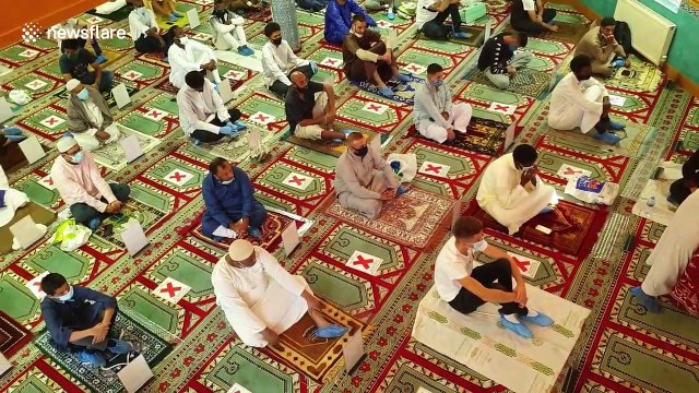 London's Muslim community observe social distancing while performing Eid al-Adha prayers