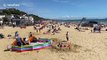 Sunseekers practice social distancing on Bournemouth beach on hottest day of the year - but councils tell people to stay away