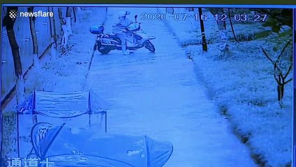 Two women narrowly escape after fort wall collapses in southern China