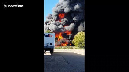 Major fire breaks out with smoke engulfing the sky at junkyard in the eastern Netherlands