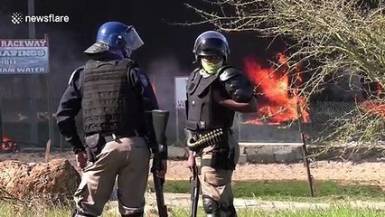 Squatters clash with South African police in Cape Town