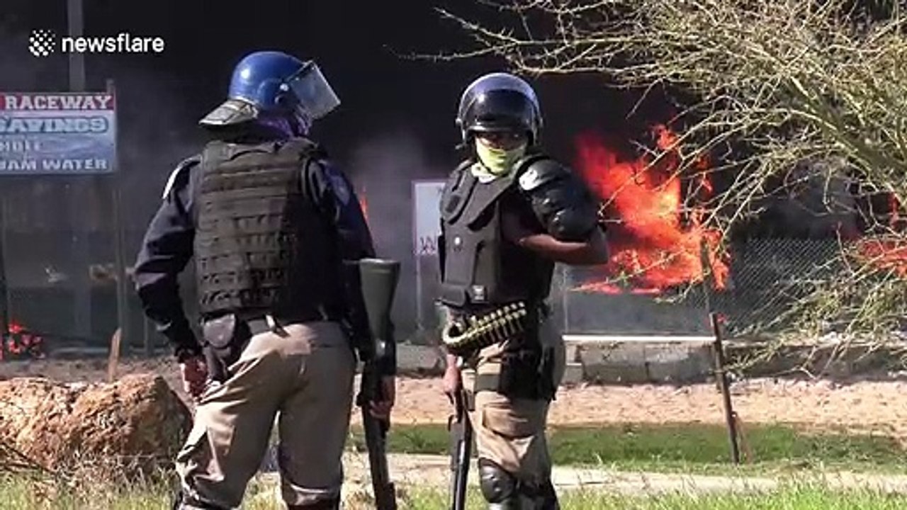 Squatters clash with South African police in Cape Town