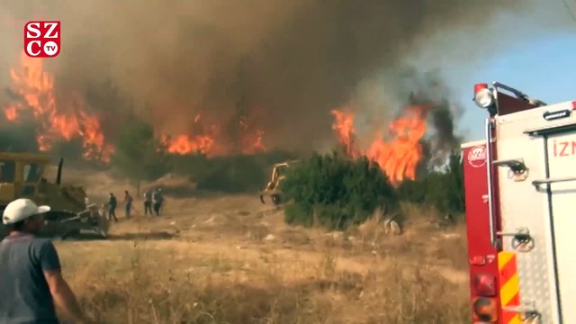 İzmir'de yangın dehşeti! Vatandaş evlere ulaşmaması için büyük gayret verdi