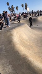 Kid Collides With Guy While Skateboarding