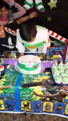 Boy Buries Head into Birthday Cake